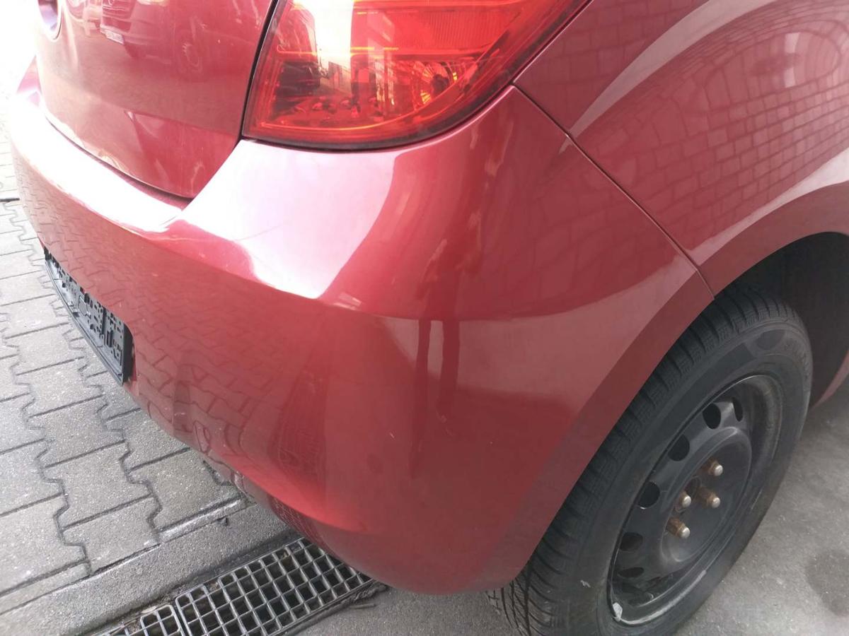 Hyundai I20 PB original Stoßstange Stossfänger hinten Berry Red 1F Bj.2009